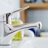 Installing an aerator on bathroom faucets, save 1.2 gallons per person per day